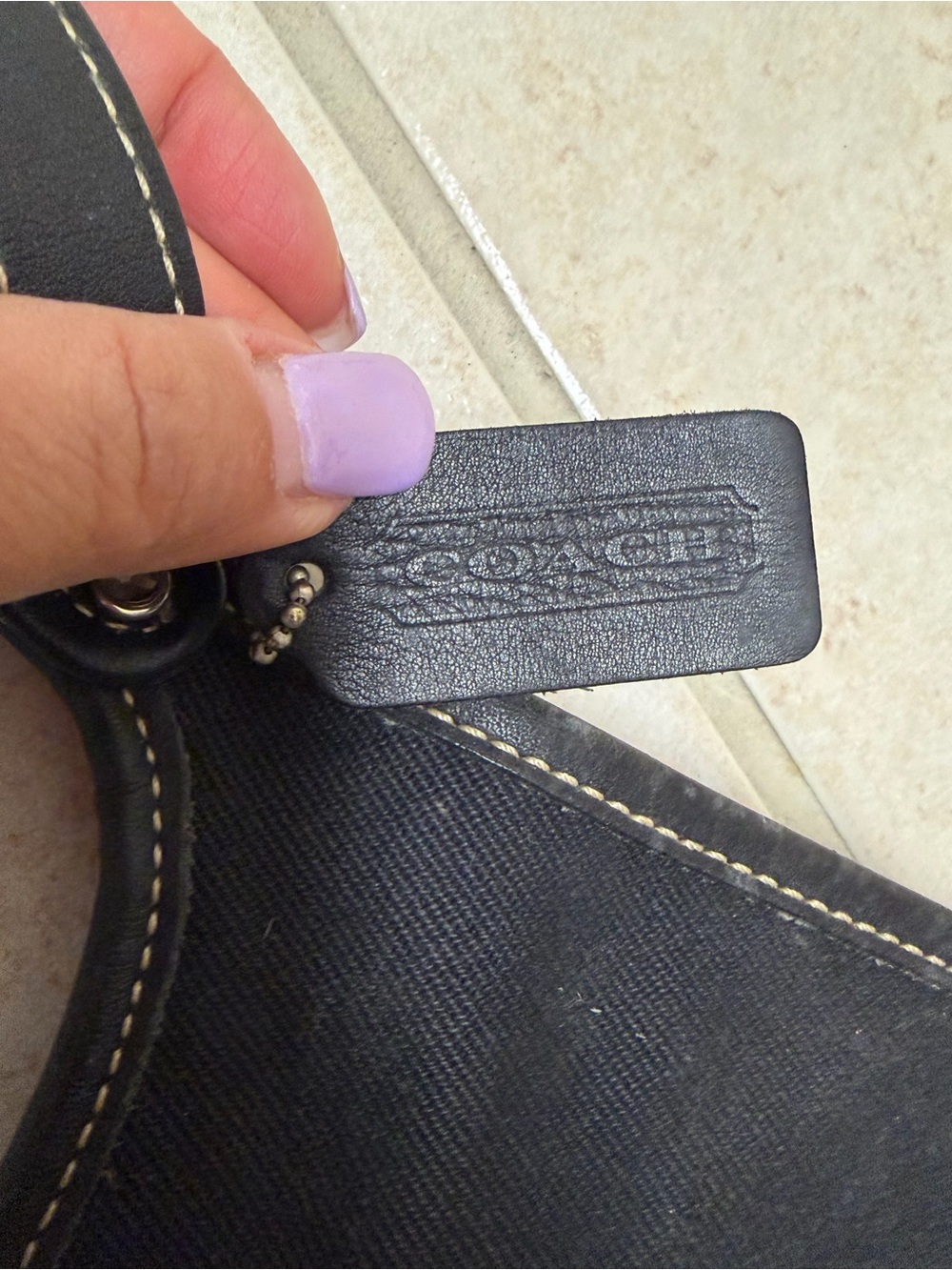 Coach Black vintage flap canvas crossbody bag.
